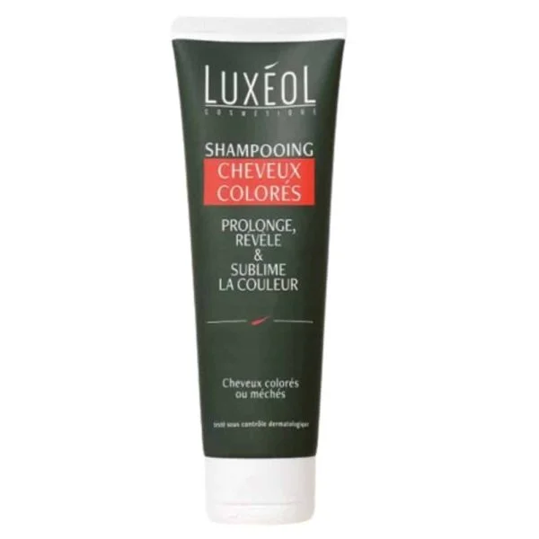 Tube vert foncé Shampooing Cheveux Colorés Luxéol, bandeau rouge, bouchon blanc