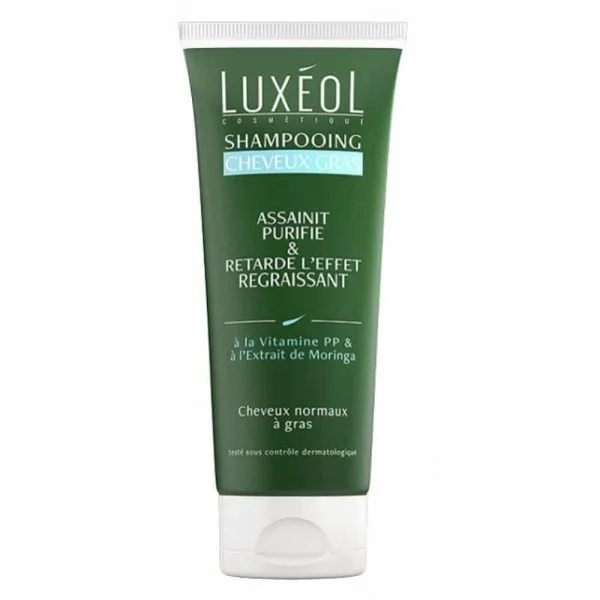 Tube vert Shampooing Cheveux Gras Luxéol, bandeau bleu clair, bouchon blanc
