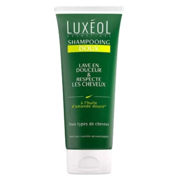 Tube vert Shampooing Doux Luxéol, bandeau jaune, bouchon blanc
