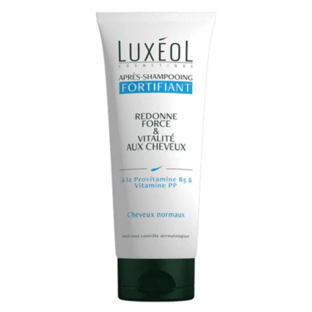 luxeol-fortifiant-apres-shampoing-force-et-vitalite-200ml.jpg Tube blanc Luxéol après-shampooing fortifiant, bandeau bleu, bouchon vert