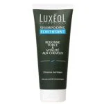 Tube vert foncé Shampooing Fortifiant Luxéol, bandeau bleu, bouchon blanc