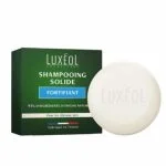 Étui vert Luxéol et galet blanc de shampooing solide fortifiant