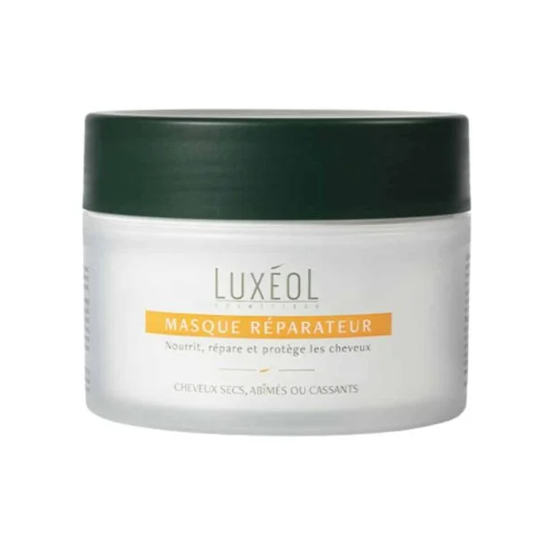 Pot blanc givré Masque Réparateur Luxéol, couvercle vert foncé, bandeau orange