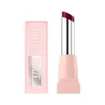 Stick baume prune foncé Maybelline Lifter Glaze posé près de son étui