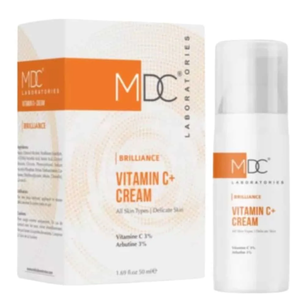 mdc-brilliance-vitamin-c-creme-50ml.jpg Flacon pompe blanc et étui orange MDC Brilliance Vitamin C+ crème 50ml
