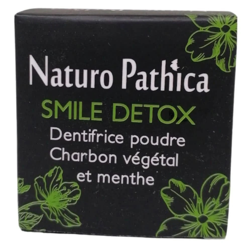 naturo-pathica-smile-detox-dentifrice-poudre-au-charbon-vegetal-et-menthe-50ml.jpg Boîte carrée noire Naturo Pathica Smile Detox, fleurs vertes, dentifrice poudre charbon