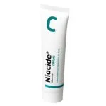 Tube blanc Niacide Advance crème avec grand C turquoise