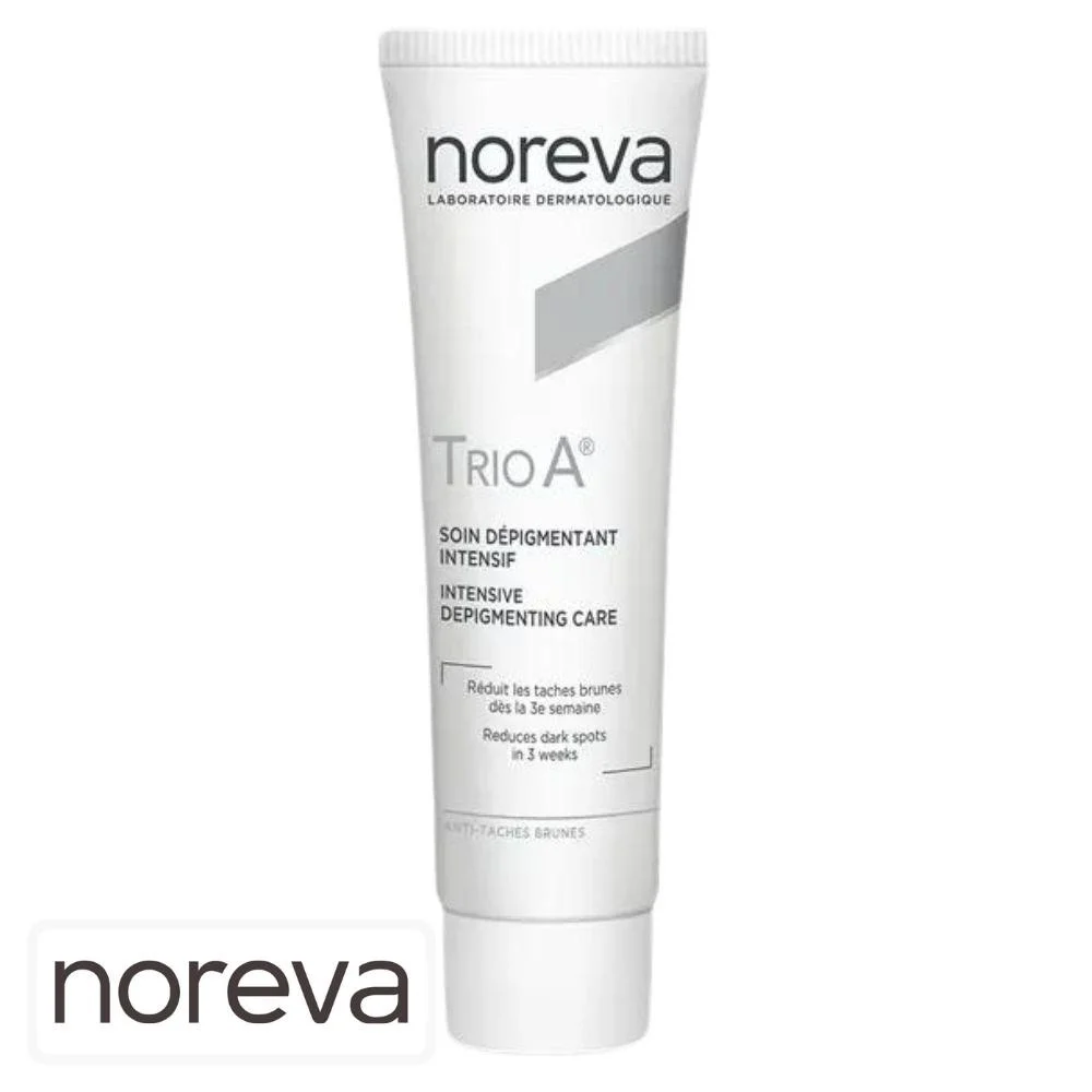 noreva-trio-a-soin-depigmentant-intensif-30ml.jpg Tube blanc et gris Noreva Trio A soin dépigmentant intensif