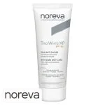 Tube blanc et gris Noreva Trio White XP SPF50+ soin anti-taches