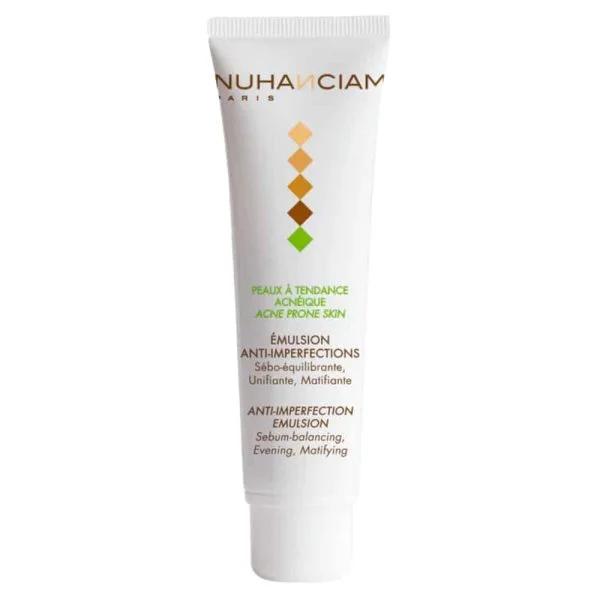 Tube blanc Nuhanciam émulsion anti-imperfections pour peaux à tendance acnéique