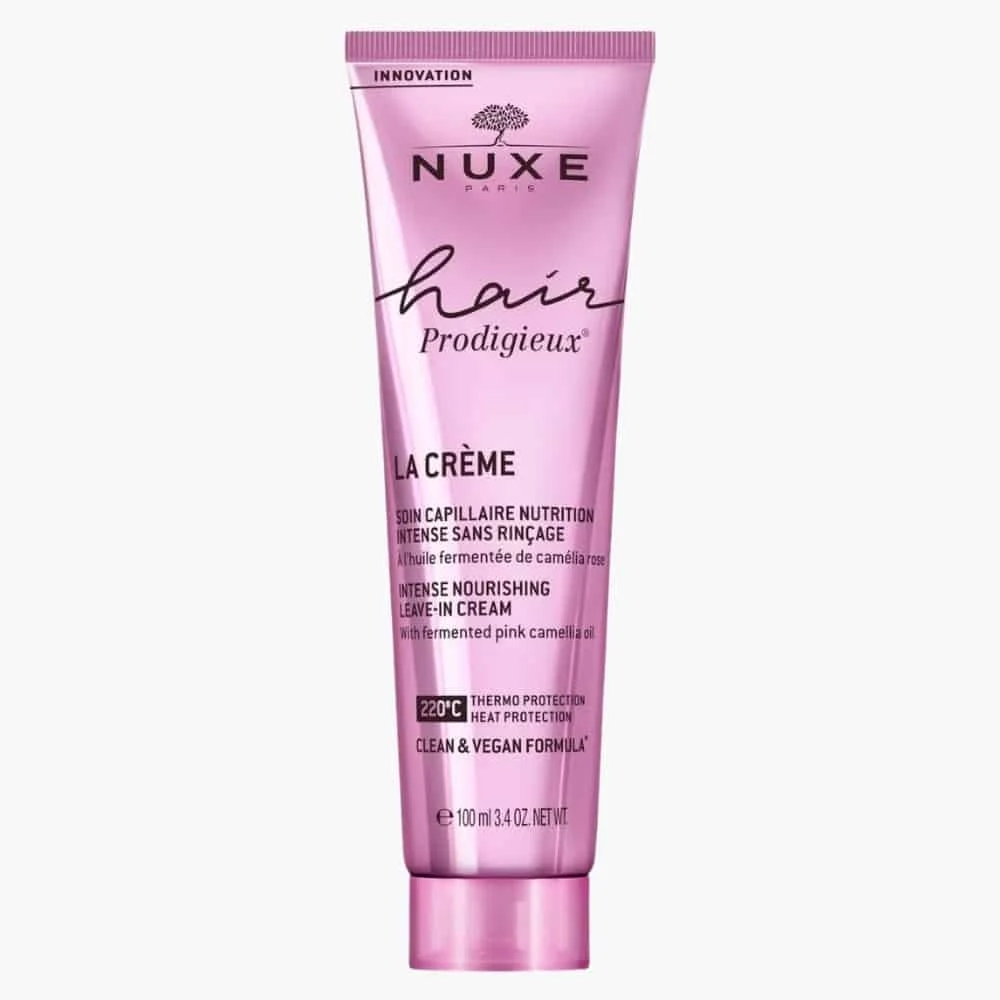 nuxe-hair-prodigieux-la-creme-soin-capillaire-nutrition-intense-sans-rincage-100ml.jpg Tube rose Nuxe Hair Prodigieux La Crème soin capillaire sans rinçage 100 ml