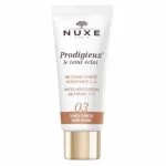 Tube blanc Nuxe Prodigieux le teint éclat BB crème teinte 03 foncée