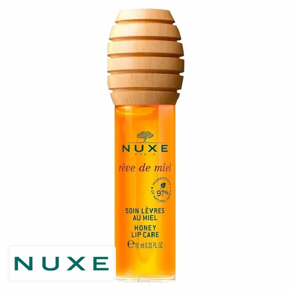 nuxe-reve-de-miel-soin-levres-au-miel-10ml.jpg Flacon ambré Nuxe Rêve de Miel soin lèvres au miel capot bois 10 ml