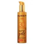 Flacon doré pailleté Nuxe Sun huile solaire Or Gold SPF30 visage et corps