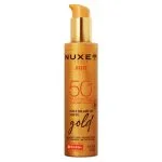 Flacon doré pailleté Nuxe Sun huile solaire Or Gold SPF50 visage et corps