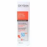 Étui blanc et orange Oxyskin crème solaire SPF 50+ peaux grasses, 40 ml