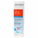 Étui blanc et rouge Oxyskin crème solaire SPF 50+ peaux sèches, 40 ml