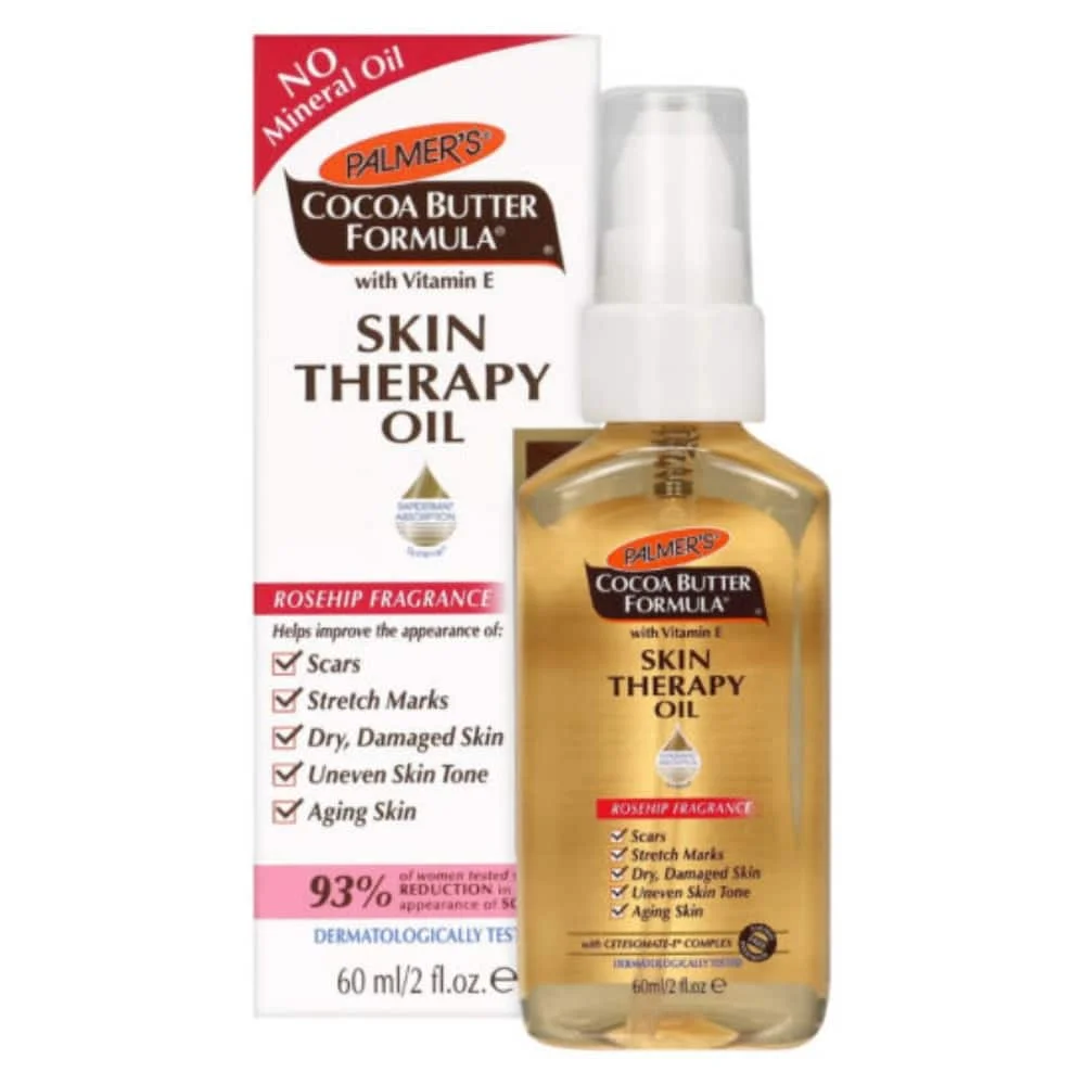 palmer-huile-therapeutique-cutanee-corps-parfumee-a-la-rose-60ml.jpg Flacon-pompe doré et boîte Palmer's Skin Therapy Oil corps 60 ml