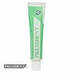 Tube vert de crème adhésive dentaire President Strong Fix