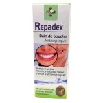 Étui vert et blanc Repadex bain de bouche antiseptique, sourire en gros plan