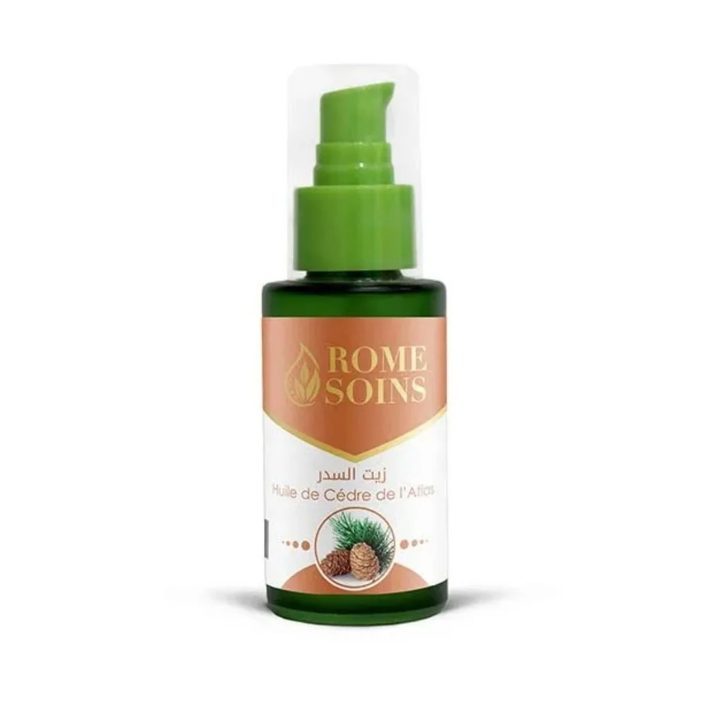 rome-soins-huile-de-cedre-de-latlas-60ml-1.jpg Flacon vert 60 ml Rome Soins huile de cèdre de l'Atlas, étiquette saumon