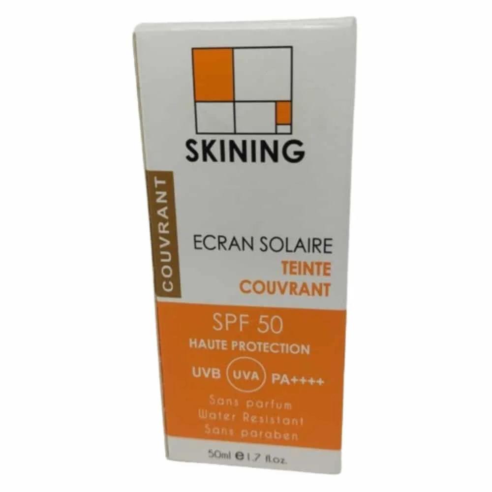 skining-ecran-solaire-teinte-couvrant-spf50-50ml.jpg Étui blanc orange et brun Skining écran solaire teinté couvrant SPF 50