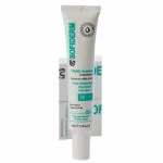 Tube blanc Sofiderm crème hydratante éclaircissante SPF 30 devant son étui
