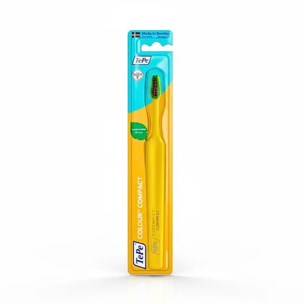 Brosse à dents TePe Colour Compact jaune sous blister, tête à brins colorés