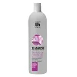 Flacon gris et violet du shampooing th pharma extrait d'oignon rouge