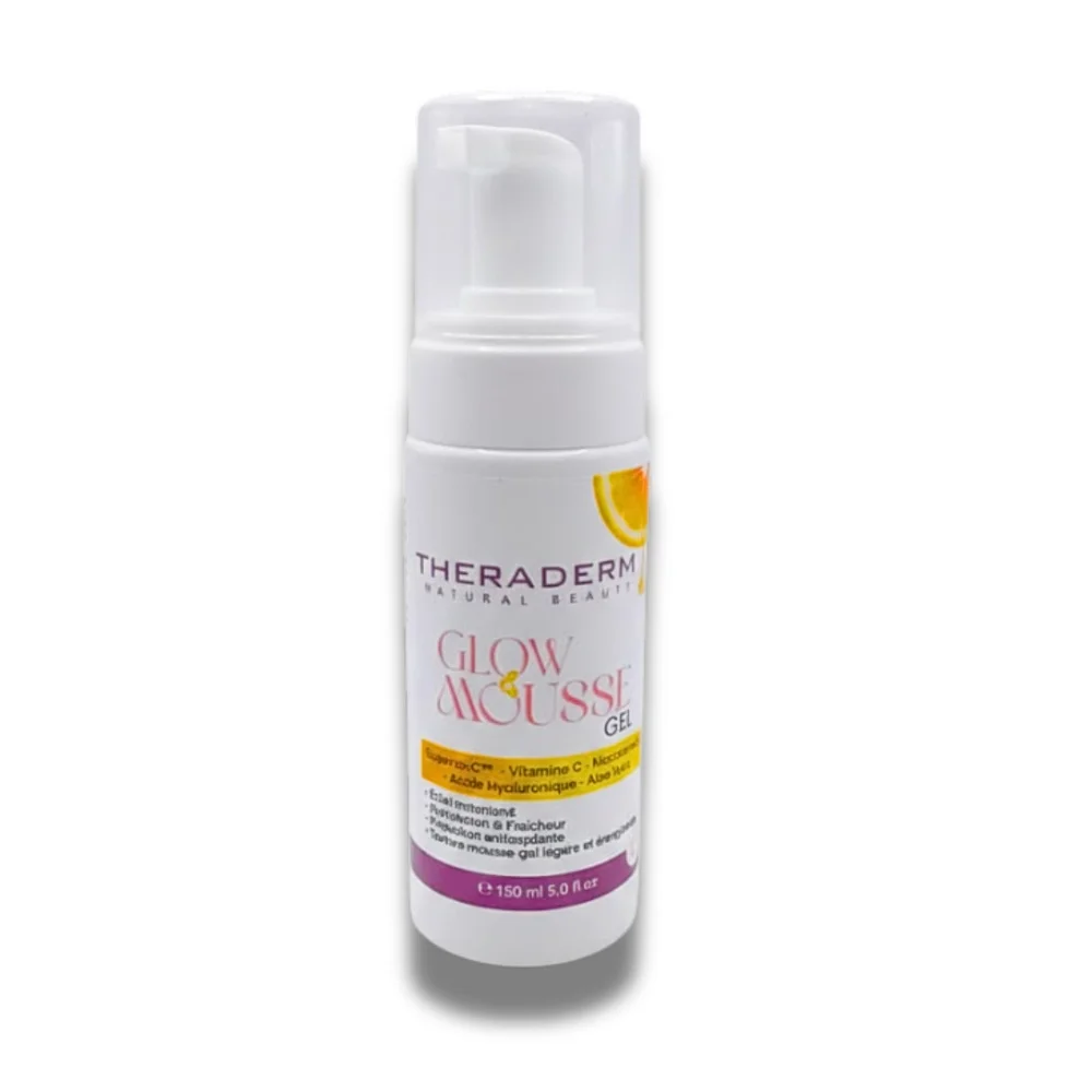 theraderm-glow-mousse-gel-150ml.jpg Flacon pompe blanc Theraderm Glow Mousse Gel 150 ml, étiquette jaune et violette