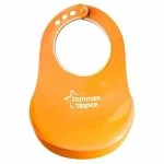 Bavoir rigide Tommee Tippee orange avec fermoir réglable à crans et poche récupératrice