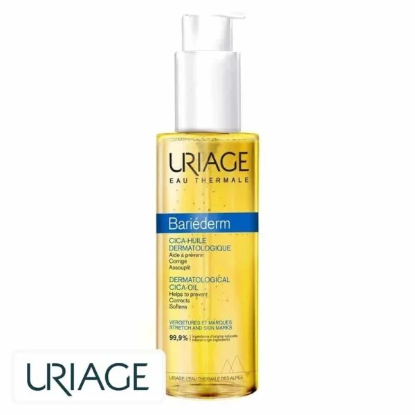 Flacon-pompe transparent d'huile dorée Uriage Bariéderm CICA-huile dermatologique