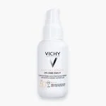 Flacon pompe blanc Vichy Capital Soleil UV-Age Daily fluide SPF 50+