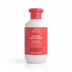 Flacon rouge et blanc du shampooing Wella Invigo Color Brilliance 300 ml