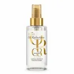 Flacon transparent de l'huile Wella Oil Reflections Light avec pompe dorée