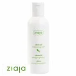 Flacon blanc Ziaja Olive Oil cleansing milk, inscriptions vertes, fond blanc