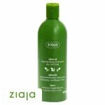 Flacon vert 400 ml de shampoing Ziaja Olive Oil régénérant, bouchon à clapet