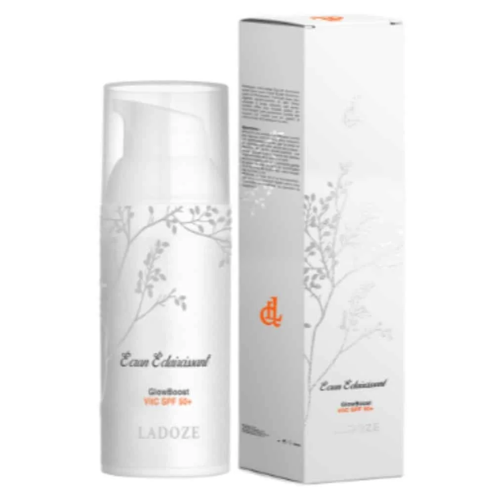ladoze-ecran-solaire-eclaicissant-vitc-spf50-50ml.jpg Flacon blanc Ladoze Écran Solaire Éclaircissant GlowBoost VitC SPF50+ et boîte assortie