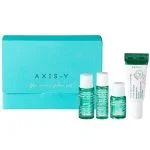 Coffret turquoise AXIS-Y The Mini Glow Set avec trois flacons verts et un tube