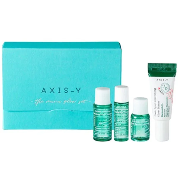 Coffret turquoise AXIS-Y The Mini Glow Set avec trois flacons verts et un tube