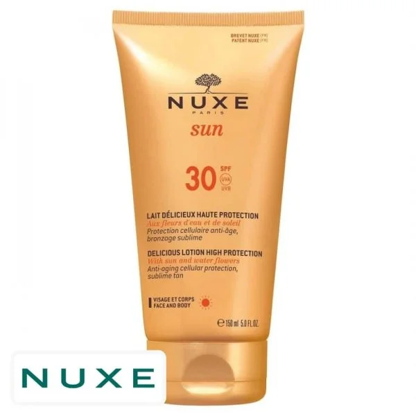Tube doré Nuxe Sun lait délicieux haute protection SPF30 visage et corps