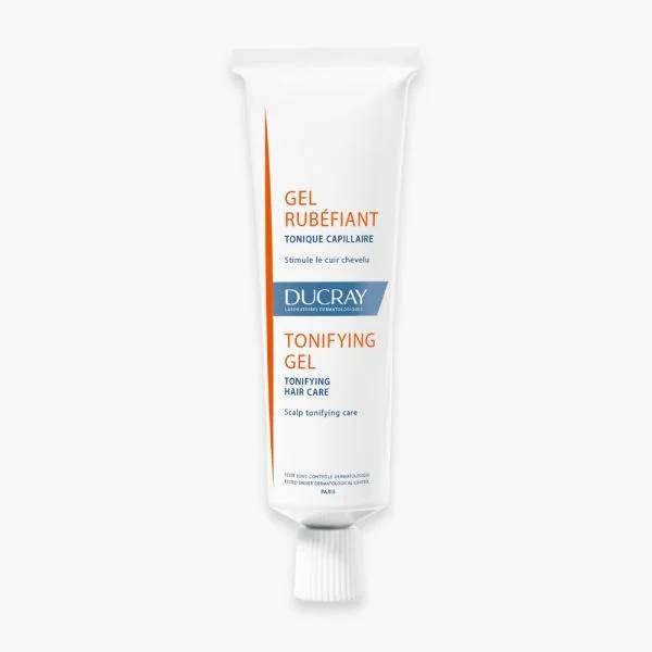 Tube blanc et orange Ducray Gel Rubéfiant tonique capillaire 30 ml