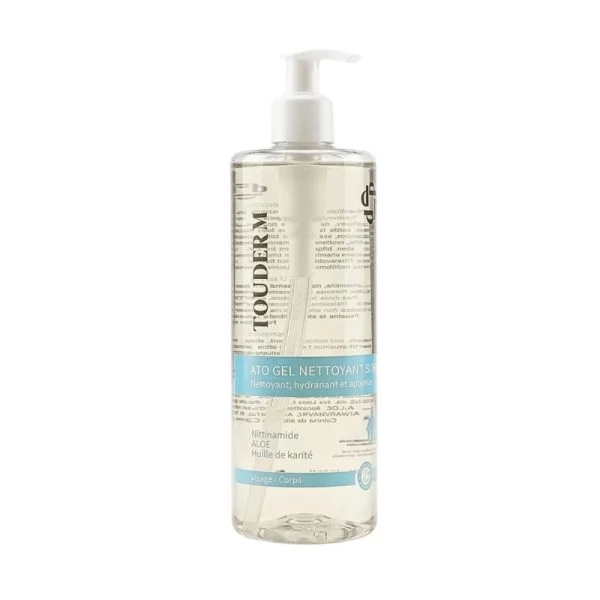 Flacon pompe transparent du gel nettoyant surgras Touderm ATO étiquette bleue