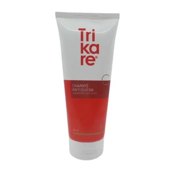 Tube blanc et rouge de shampooing anti-chute Trikare Champô Antiqueda
